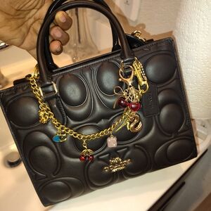 Small Coach Maggie Tote In Black Signature Leather